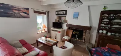 Télévision ou salle de divertissement dans l'établissement Ty Coz
