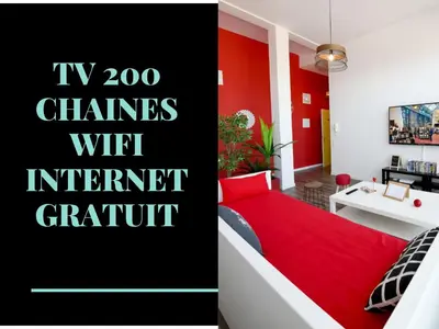 Télévision ou salle de divertissement dans l'établissement Appart Cosy Brest Les Capucins