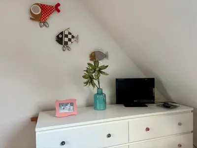 Télévision ou salle de divertissement dans l'établissement TY SEA