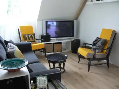 Télévision ou salle de divertissement dans l'établissement TyNoLa