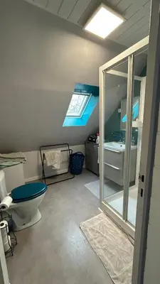 Salle de bains dans l'établissement Entre terre et mer