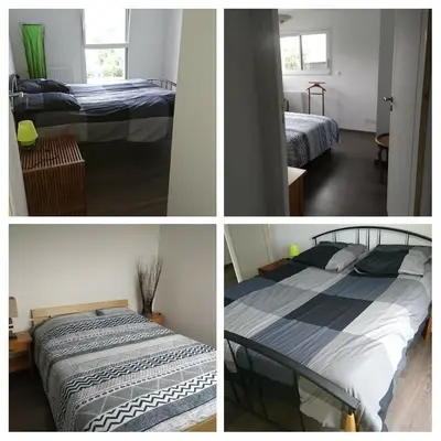 Un ou plusieurs lits dans un hébergement de l'établissement TY SAM BELLE MAISON MODERNE 8 à 10 personnes - PROCHE plages et commerces