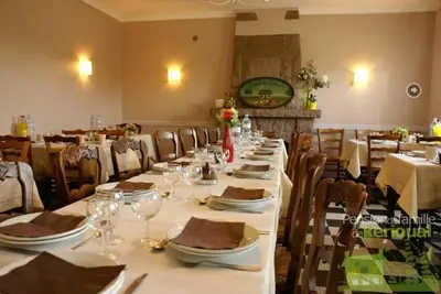 Restaurant ou autre lieu de restauration dans l'établissement Pension de Kerioual