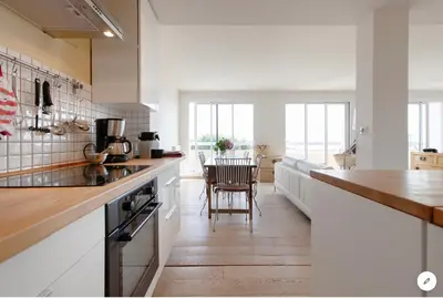 Cuisine ou kitchenette dans l'établissement Aux 4 Sardines T2 56m2