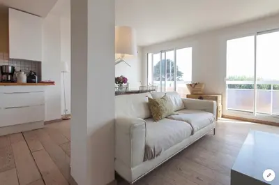 Coin salon dans l'établissement Aux 4 Sardines T2 56m2