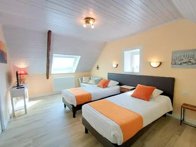 Un ou plusieurs lits dans un hébergement de l'établissement Kerantum à10mn des baies de Douarnenez et Audierne avec cuisine à disposition