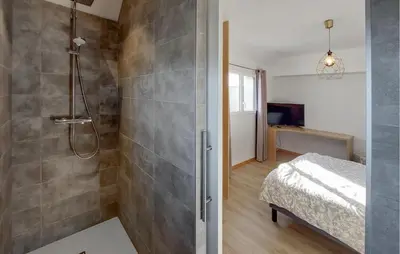 Un ou plusieurs lits dans un hébergement de l'établissement Lovely Home In Guisseny