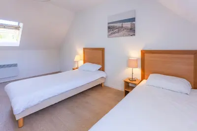 Un ou plusieurs lits dans un hébergement de l'établissement Résidence Odalys Horizon - Presqu'Ile de Crozon