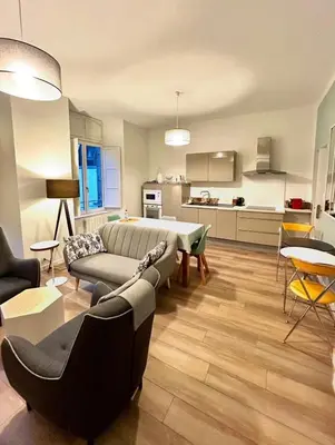 Cuisine ou kitchenette dans l'établissement La Palmeraie - Appartement classé 4 étoiles - Hyper centre ville