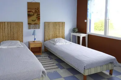 Un ou plusieurs lits dans un hébergement de l'établissement Holiday Home in Le Guilvinec near Sandy Beach