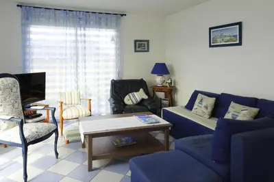 Coin salon dans l'établissement Holiday Home in Le Guilvinec near Sandy Beach