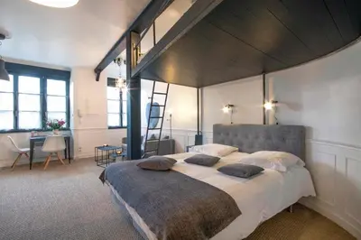 Un ou plusieurs lits dans un hébergement de l'établissement N9 Appartement de Charme