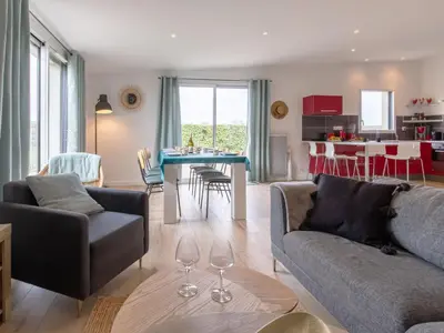 Coin salon dans l'établissement Holiday Home Ty Amiets by Interhome