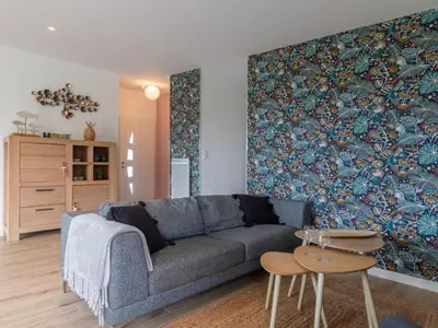 Coin salon dans l'établissement Holiday Home Ty Amiets by Interhome
