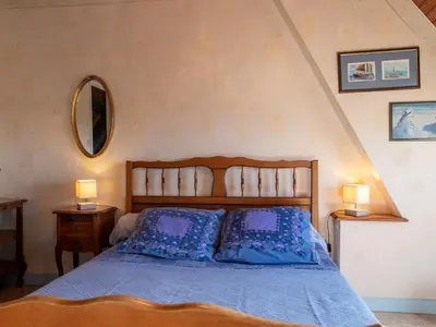 Un ou plusieurs lits dans un hébergement de l'établissement Holiday Home Manoir des Halles by Interhome