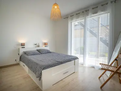 Un ou plusieurs lits dans un hébergement de l'établissement Holiday Home Les Dunes by Interhome