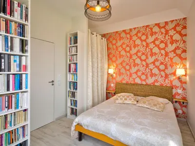 Un ou plusieurs lits dans un hébergement de l'établissement Holiday Home Orphée by Interhome