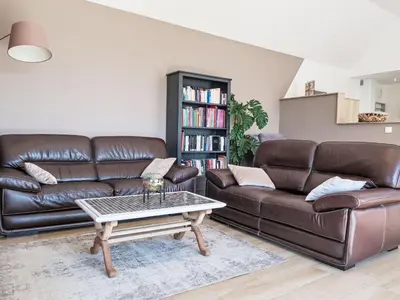 Coin salon dans l'établissement Holiday Home Orphée by Interhome