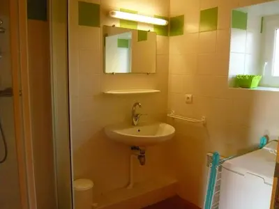 Salle de bains dans l'établissement L'olivier