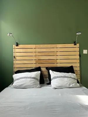 Un ou plusieurs lits dans un hébergement de l'établissement La Petite Maison