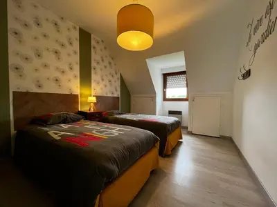 Un ou plusieurs lits dans un hébergement de l'établissement Gîte du Cosquer