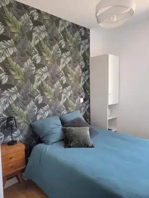 Un ou plusieurs lits dans un hébergement de l'établissement Les Aigrettes - Appartement spacieux - Terrasse et garage