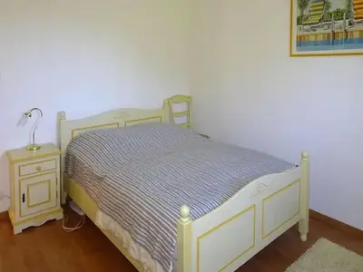 Un ou plusieurs lits dans un hébergement de l'établissement Holiday Home in Bénodet with Pool & Beaches