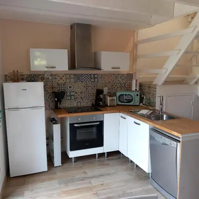 Cuisine ou kitchenette dans l'établissement La Demoiselle du Finistère