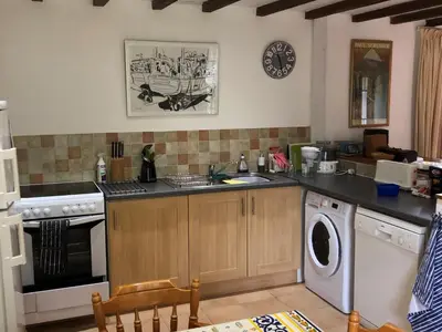 Cuisine ou kitchenette dans l'établissement Kerlogan