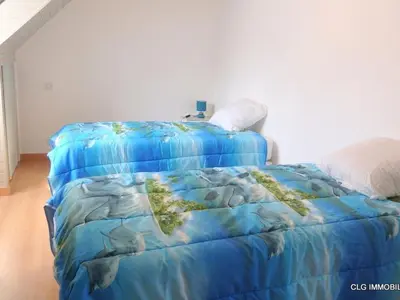 Un ou plusieurs lits dans un hébergement de l'établissement Maison calme avec jardin clos, proche plage Cap Coz, 5 chambres, garage - Fouesnant - FR-1-481-68