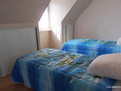 Un ou plusieurs lits dans un hébergement de l'établissement Maison calme avec jardin clos, proche plage Cap Coz, 5 chambres, garage - Fouesnant - FR-1-481-68