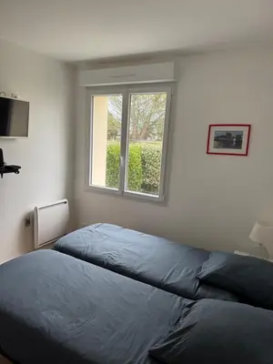 Un ou plusieurs lits dans un hébergement de l'établissement Ar Marc'h-Mor Glaz beach 60 meters