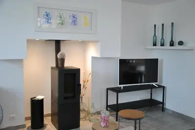 Télévision ou salle de divertissement dans l'établissement Cap sur le Phare à Moguériec