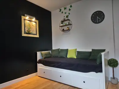 Un ou plusieurs lits dans un hébergement de l'établissement Appart Cosy Brest (Les 4 moulins)