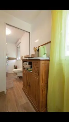 Un ou plusieurs lits dans un hébergement de l'établissement Envol du Phénix - chambre suite et cuisine en rdc