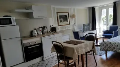 Cuisine ou kitchenette dans l'établissement Appart'hotel de la Mairie