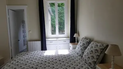 Un ou plusieurs lits dans un hébergement de l'établissement Appart'hotel de la Mairie