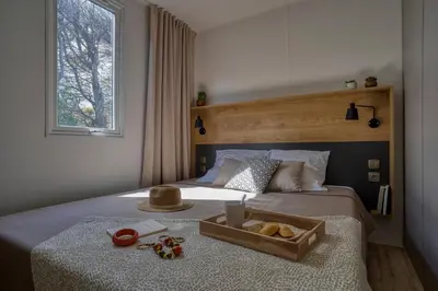 Un ou plusieurs lits dans un hébergement de l'établissement Slow Village Breizh Légendes