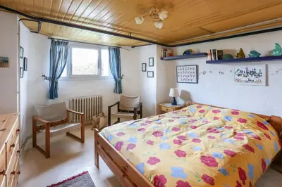 Un ou plusieurs lits dans un hébergement de l'établissement CABESTAN - Maison de famille au coeur du bourg - Vue Mer