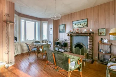 Coin salon dans l'établissement CABESTAN - Maison de famille au coeur du bourg - Vue Mer