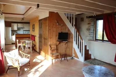 Cuisine ou kitchenette dans l'établissement Les Gîtes Aux Volets Roses