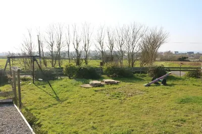 Jardin de l'établissement Les Gîtes Aux Volets Roses