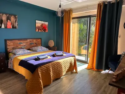 Un ou plusieurs lits dans un hébergement de l'établissement Chambres d'hôtes villa du Sieck plage piscine