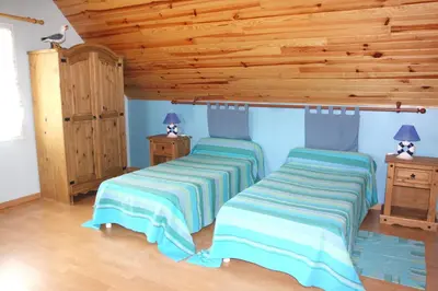 Un ou plusieurs lits dans un hébergement de l'établissement Gîte 4 km mer, 1 km centre ville, pour 8 pers