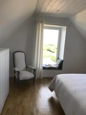 Un ou plusieurs lits dans un hébergement de l'établissement Ty Dag - La Désirade proche plage et jacuzzi