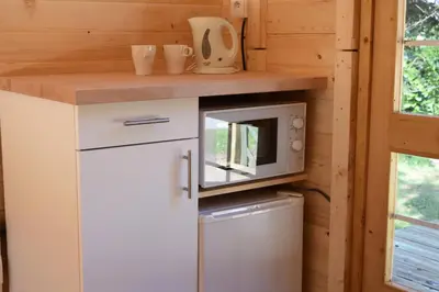 Cuisine ou kitchenette dans l'établissement La Pointe Camping