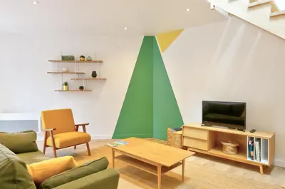 Télévision ou salle de divertissement dans l'établissement Résidence du Phare - 4 appartements - 2 chambres - Vue mer ou Terrasse