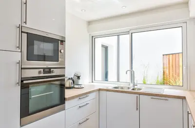 Cuisine ou kitchenette dans l'établissement Résidence du Phare - 4 appartements - 2 chambres - Vue mer ou Terrasse