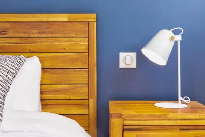 Un ou plusieurs lits dans un hébergement de l'établissement Résidence du Phare - 4 appartements - 2 chambres - Vue mer ou Terrasse
