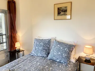 Un ou plusieurs lits dans un hébergement de l'établissement Superbe maison avec jardin, proche plage, chiens admis - FR-1-542-25